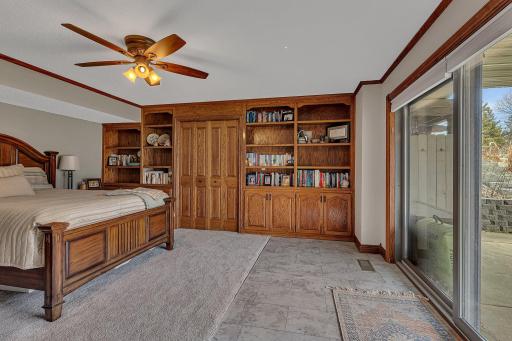 Elevated woodwork throughout, bedroom has updated patio door opening right to the backyard.