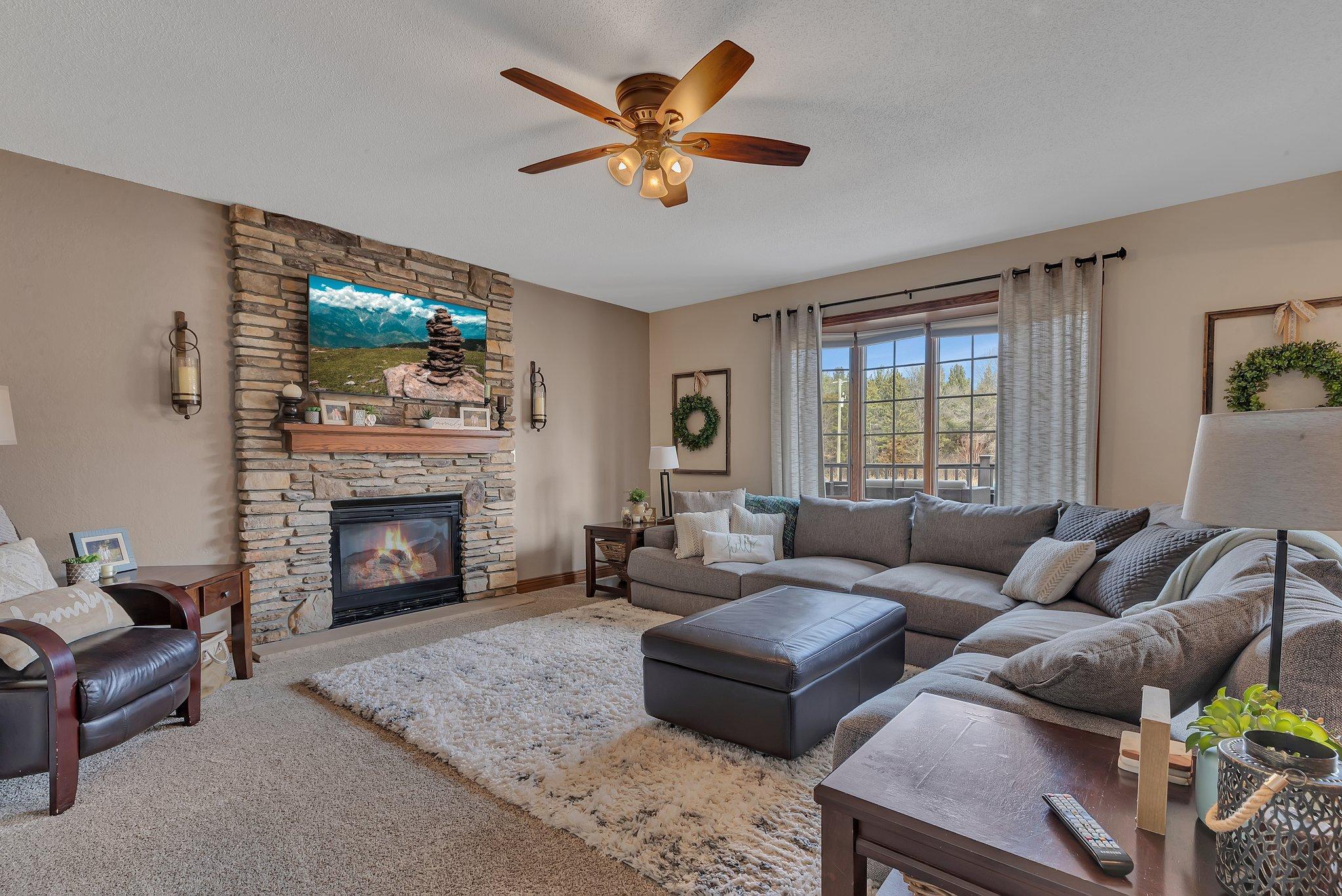 Main floor living room perfectly situated right off the kitchen/dining.