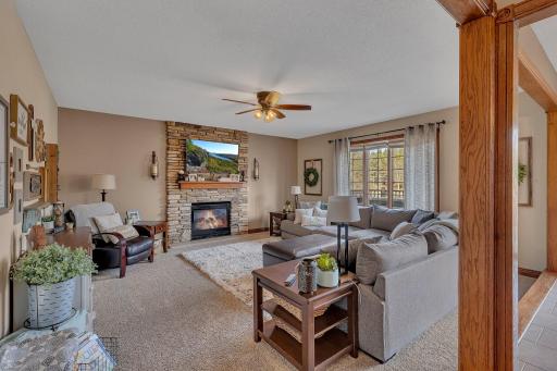 Main floor living room with gas fireplace and gorgeously updated surround.