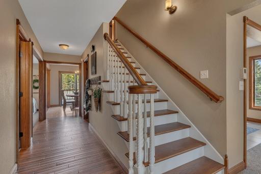 The elevated open staircase greets you as you enter the home.