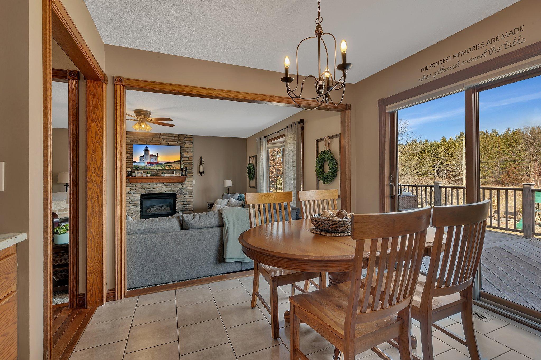 Informal dining flows seamlessly from the kitchen into the main floor living room.