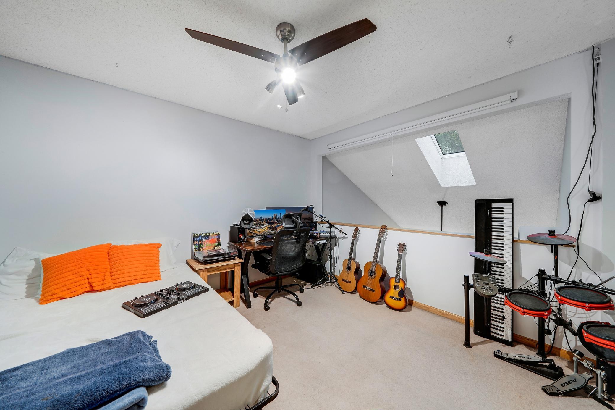 The upper loft area is perfect for a non-conforming 4th bedroom.