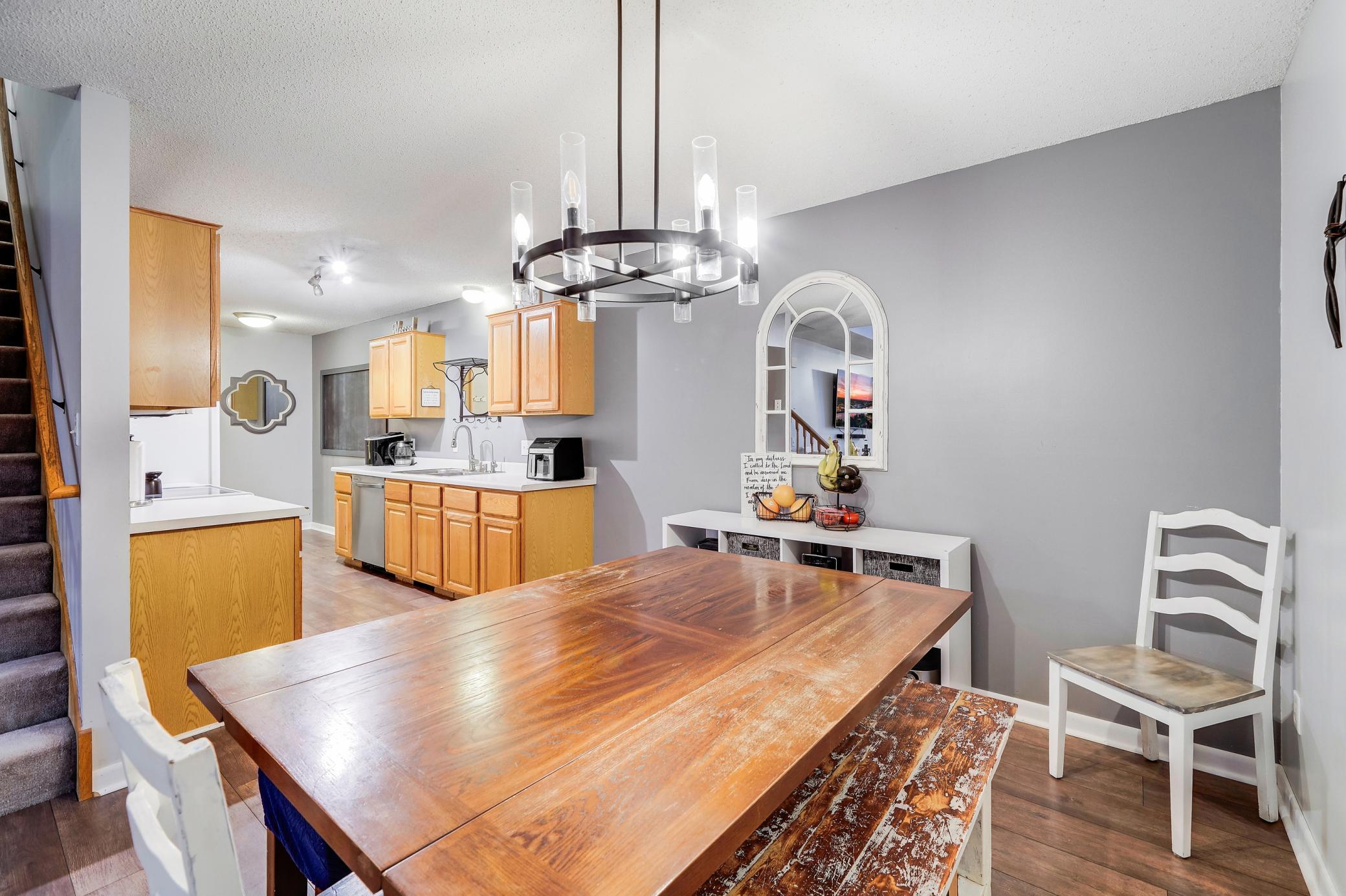 Warm honey-oak finish on the cabinetry offers a bright and cheerful tone.
