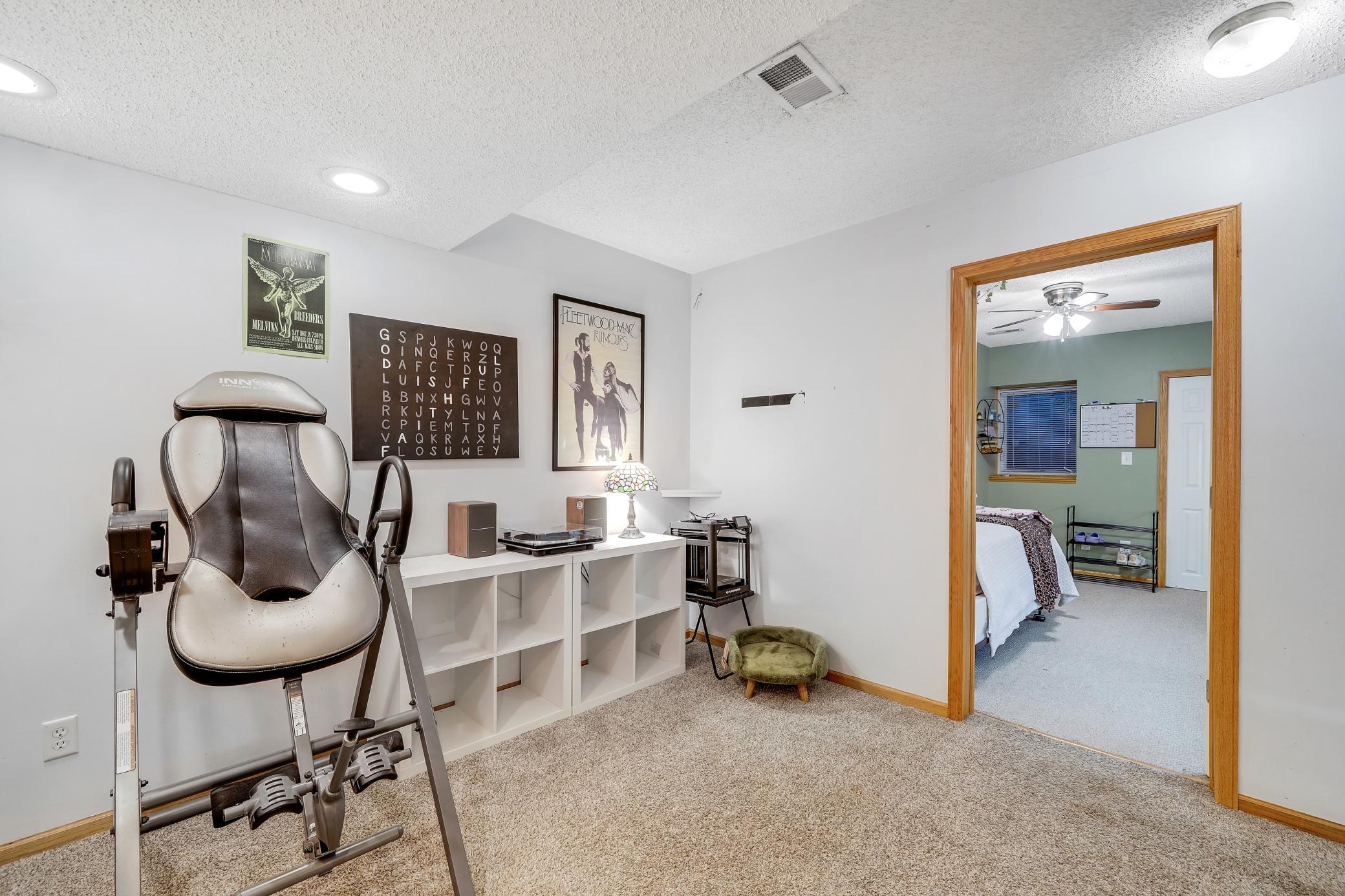 The basement offers a bathroom, a bedroom, and a family room.