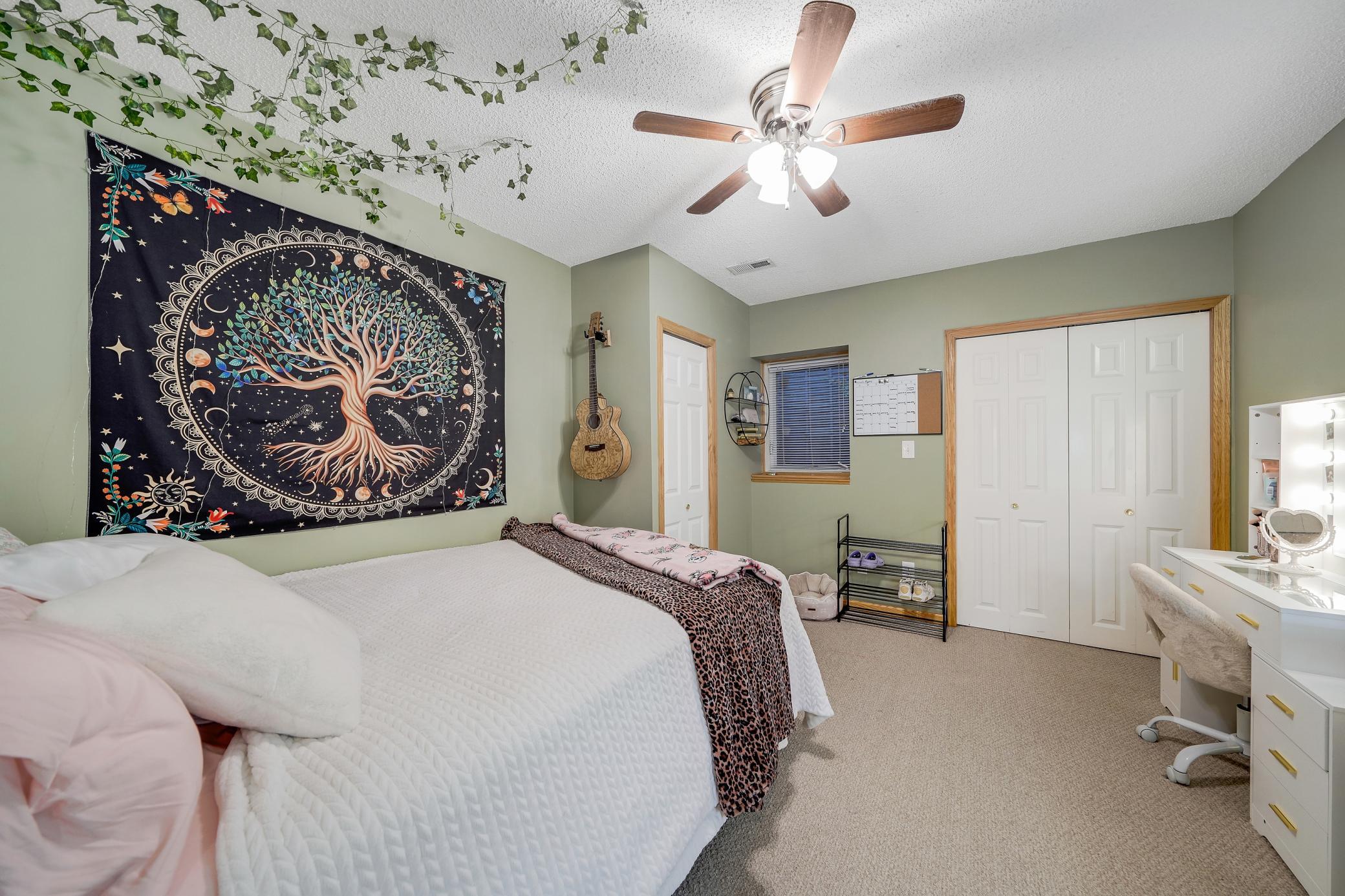 The lower level has good ceiling height, and perfect for guests, or another home office.
