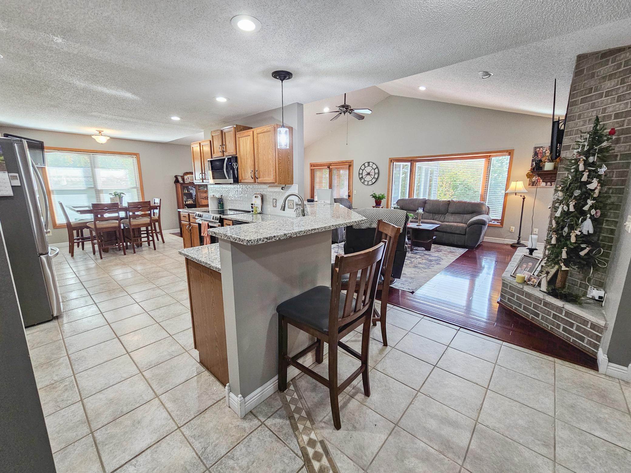View of Kitchen and Living from Foyer