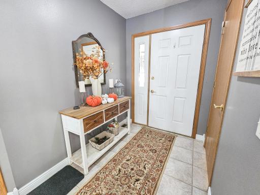 Foyer, front door and lower level entrance
