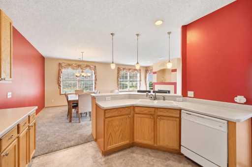 Warmly Lit Open-Plan Kitchen and Dining Area.png