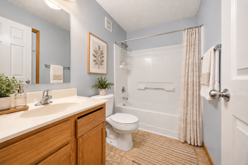 xAiry Modern Bathroom with Warm Oak Accents.png