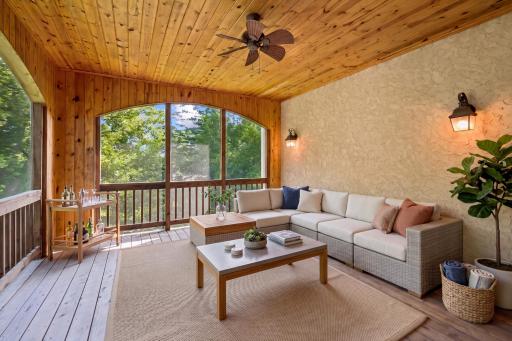 Fabulous screed porch, great for relaxing or entertaining (furniture is AI staged)
