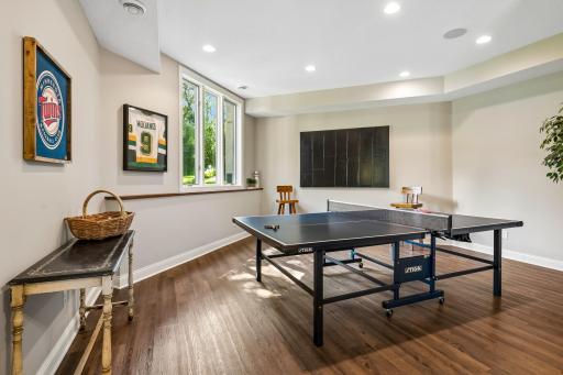 Game on, bring your competitive juices whether ping pong, pool or air hockey. Luxury vinyl flooring finishes the room