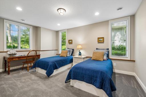 Lower level fifth bedroom with plenty of light and nook for a good-sized desk