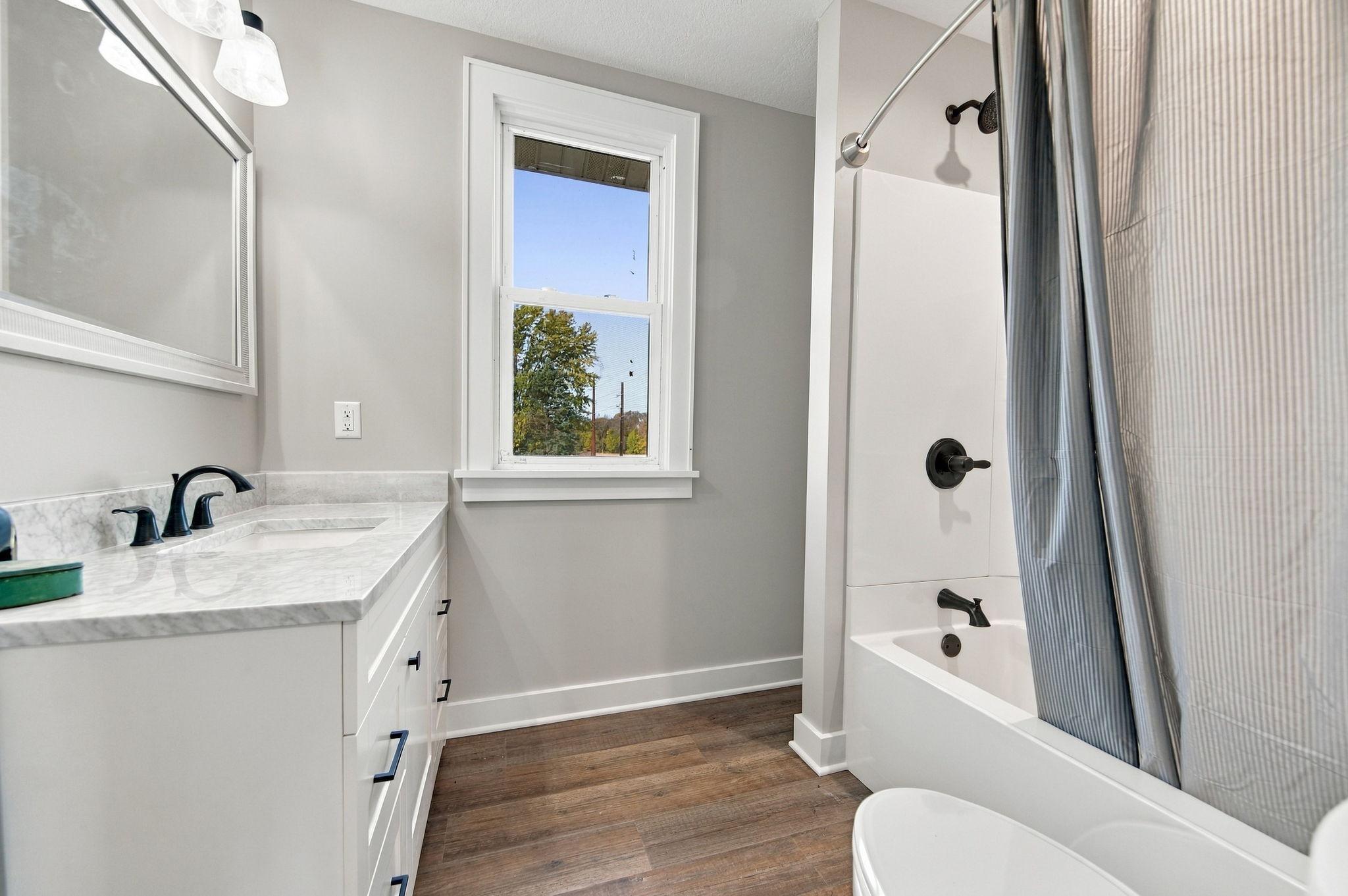 Upper level full bathroom.