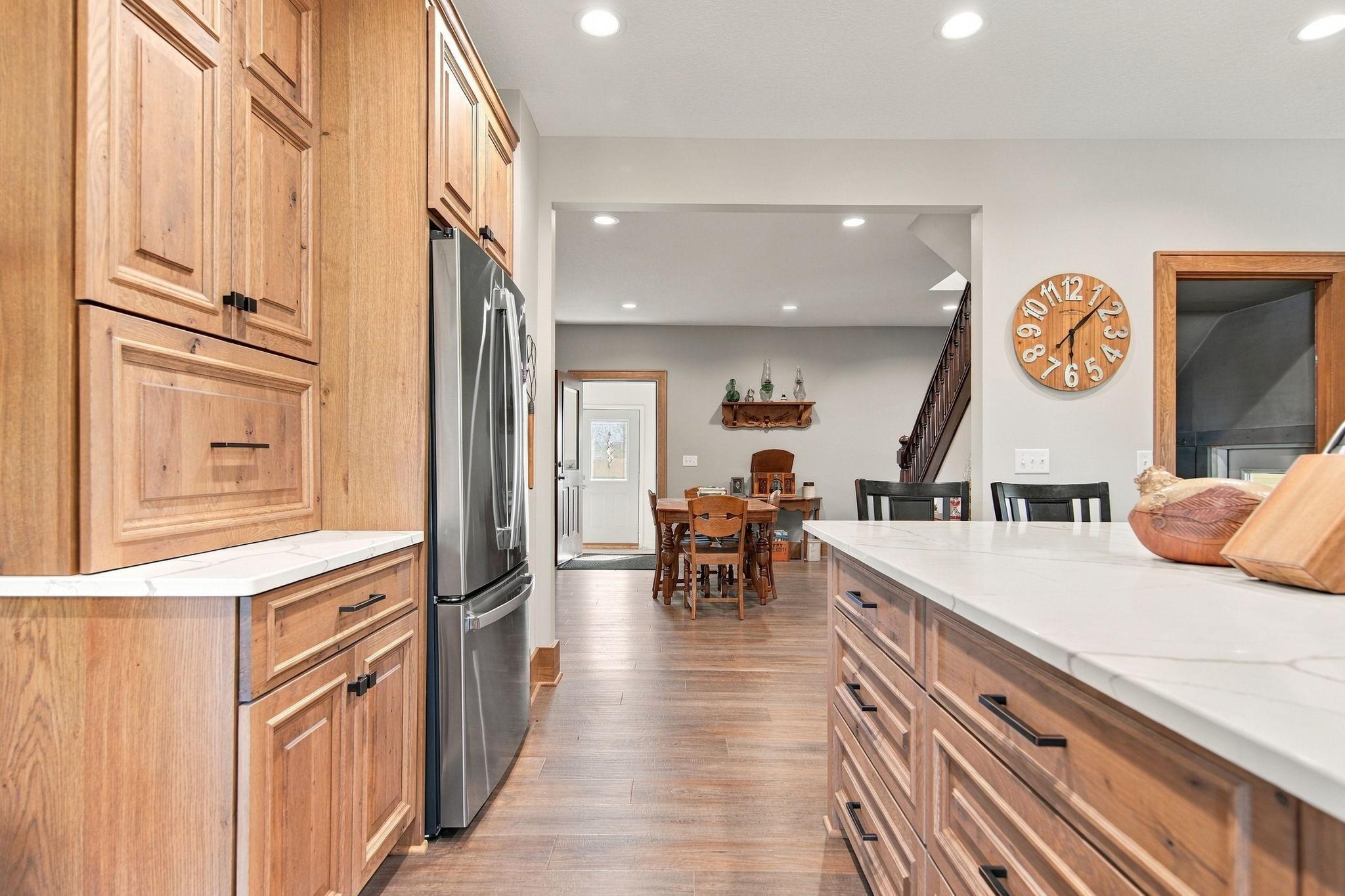 Kitchen flows into the dining room.