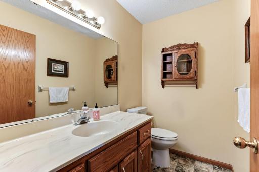 Main-level half bath offering convenient, easy access for guests and everyday use.