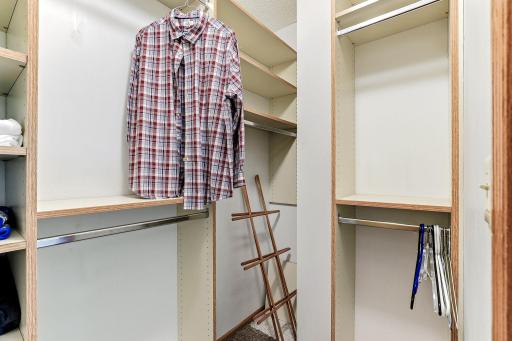 Spacious primary walk-in closet offering organized, convenient storage for everyday living.