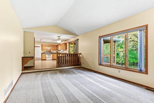 Two main-level gathering spacesâliving room and family roomâoffering flexible, connected living.