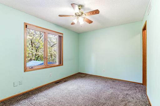 Third and final upper-level bedroom offering comfortable space and flexible everyday use.