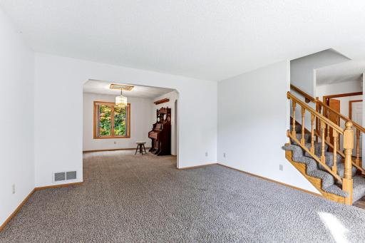 Living room seamlessly connected to the dining room for open, effortless main-level flow.