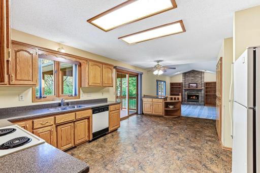 Open layout designed for easy flow, bright light, and comfortable everyday living. Movable Kitchen Island for Flexible Prep and Dining.