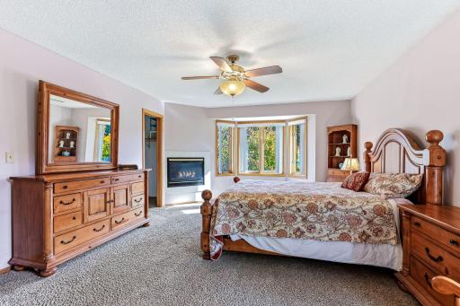 Spacious primary bedroom with a generous walk-in closet and a roomy private bath for elevated everyday comfort.