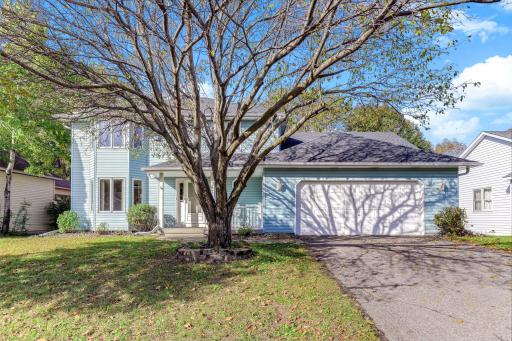 Beautiful home surrounded by lush natural scenery with convenient access to multiple walking paths.