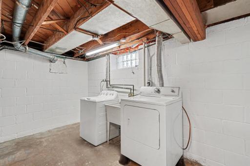 USE THIS LAUNDRY ROOM AS IS OR GIVE IT A FINISHING TOUCH