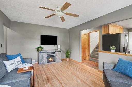 SPACIOUS LIVING ROOM IS OPEN TO KITCHEN MAKES FOR GREAT ENTERTAINING
