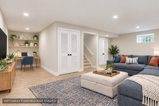 THIS ROOM HAS BEEN VIRTUALLY FINISHED AND STAGED AS A FAMILY ROOM AND OFFICE AREA WITH UTILITY ROOM AND LAUNDRY ROOM BEHIND THE DOORS