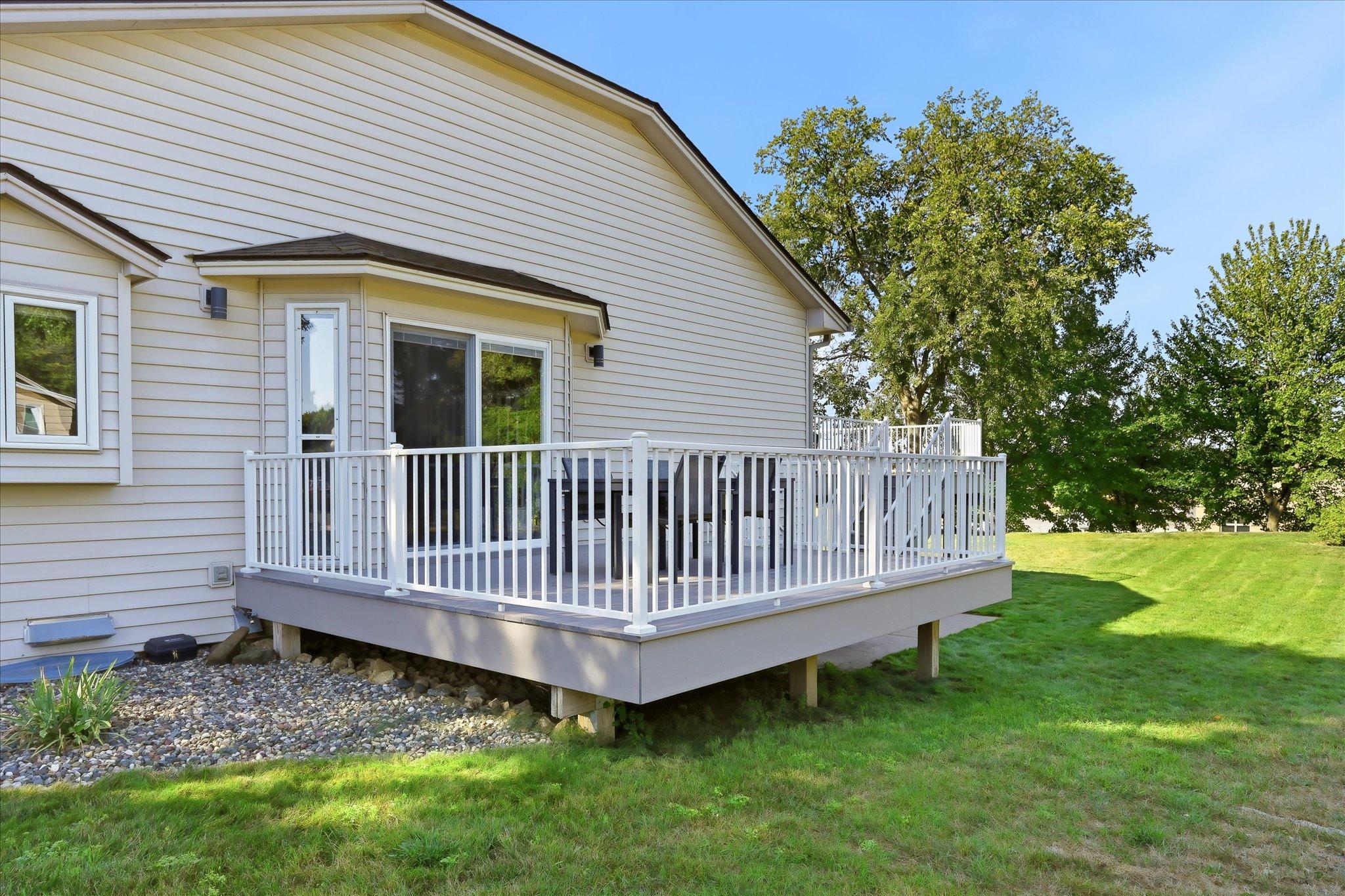 Multiple outdoor spaces make it easy to enjoy the yard from different areas of the home.