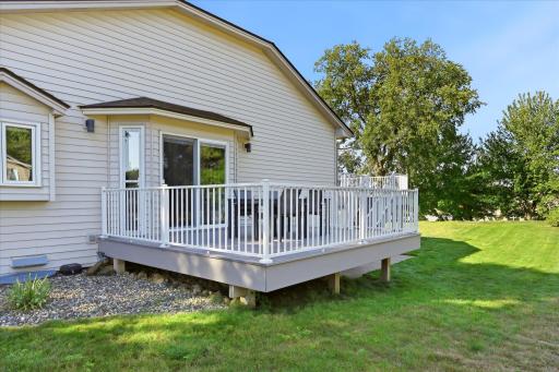 Multiple outdoor spaces make it easy to enjoy the yard from different areas of the home.