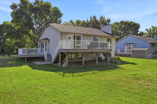 Enjoy expanded outdoor living space with two decks updated with low-maintenance Azek decking in 2020.