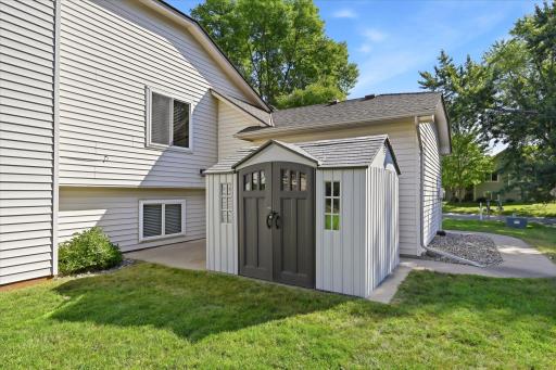 Shed provides extra storage for yard tools and more.
