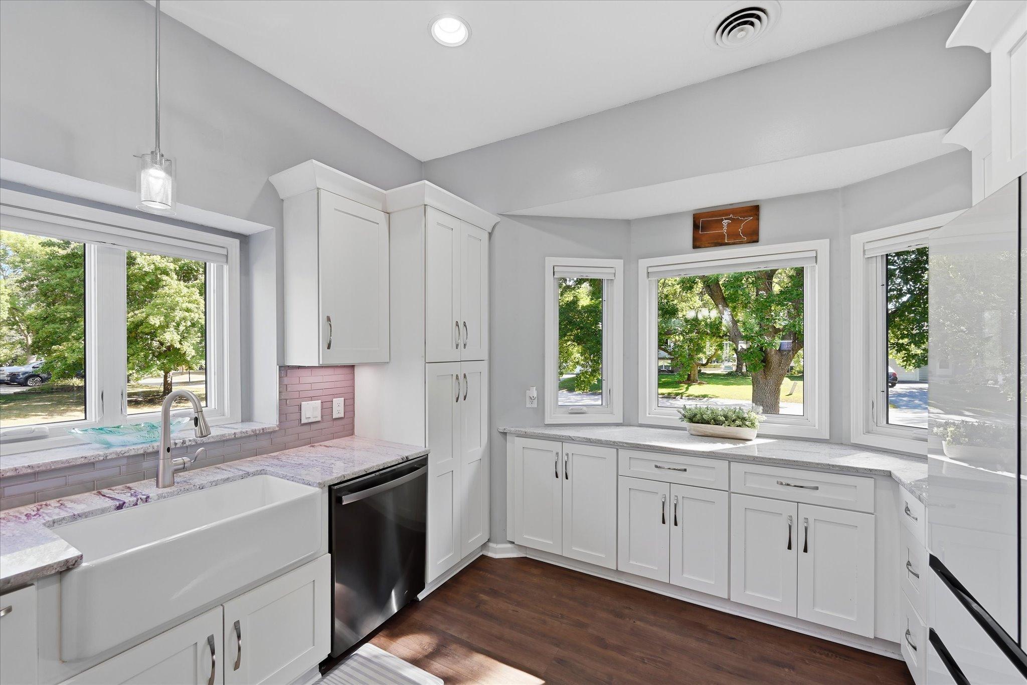 A touchless kitchen faucet adds convenience to this remodeled kitchen, making everyday cleanup a little easier.