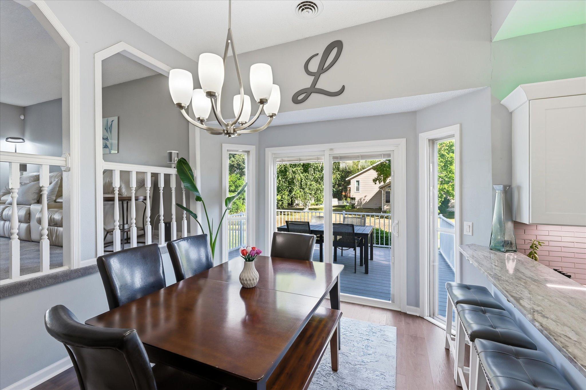 Enjoy easy access to the deck for a seamless transition between indoor and outdoor dining.