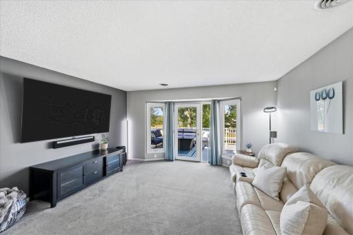 A comfortable gathering space filled with natural light and easy access to the second deck.