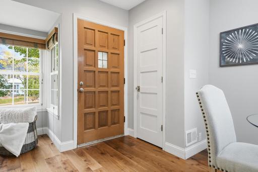 Mid-century period details intact, like this stunning 15-panel entry door.