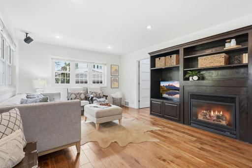 Gas fireplace makes this space cozy and ready for movie nights and morning coffee alike