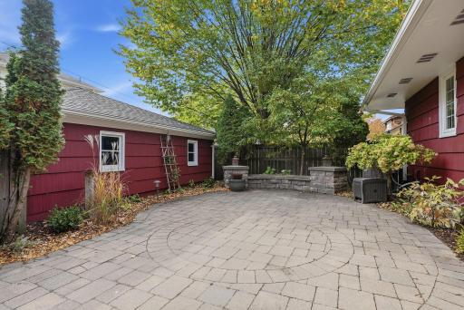 This backyard features custom stonework and professional landscaping!