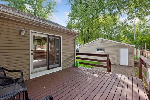 Walk out to deck from family room and to garage via patio