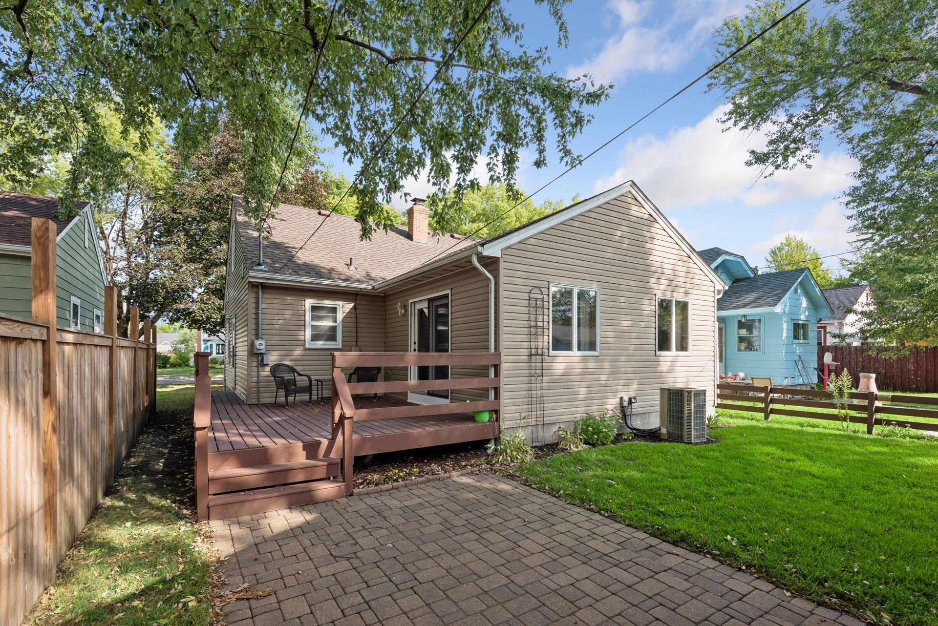 Deck off family room walks onto paver patio