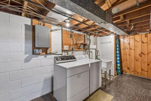 Lower Level laundry with utility sink and shower
