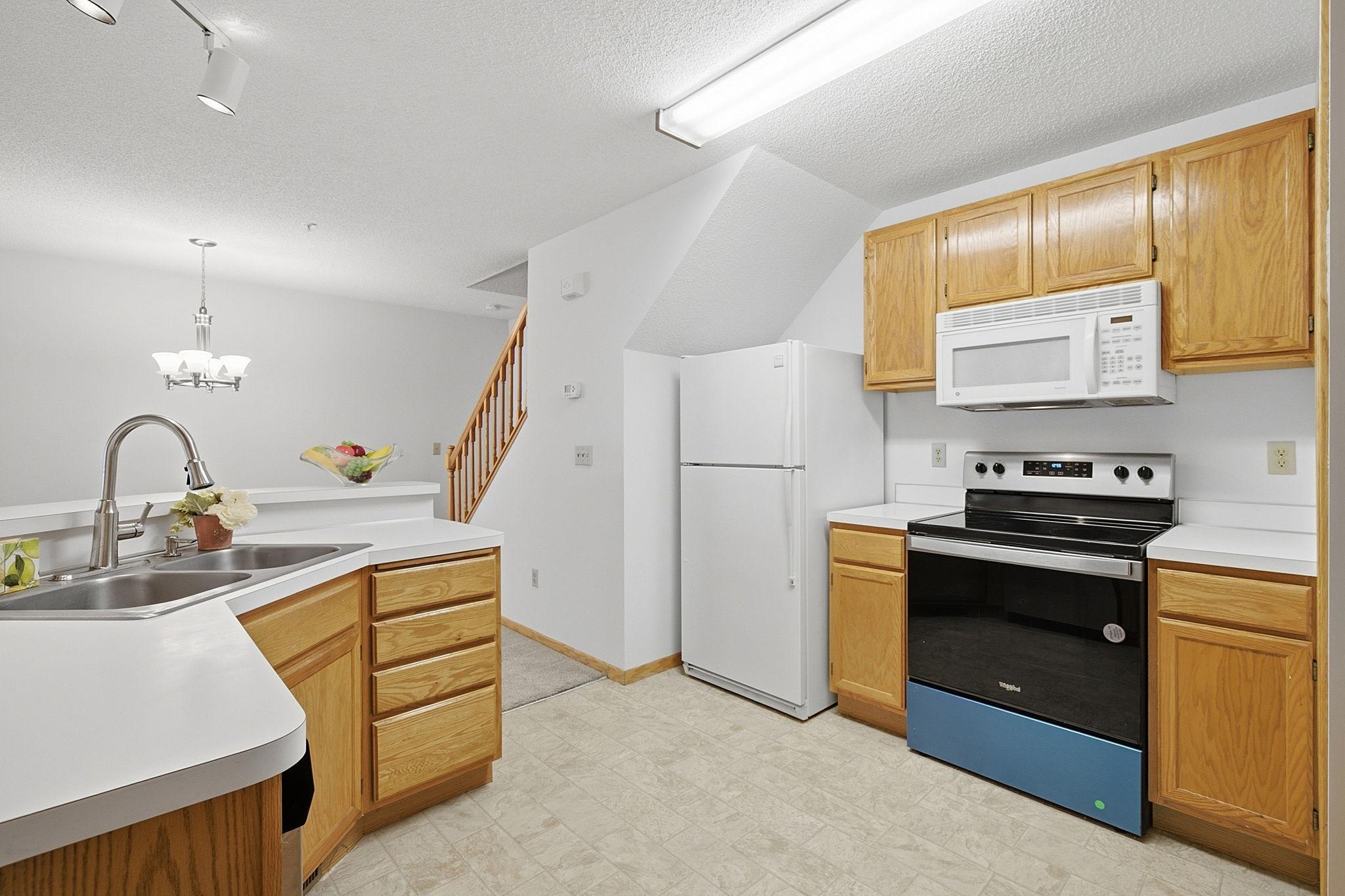Kitchen with a newer range.