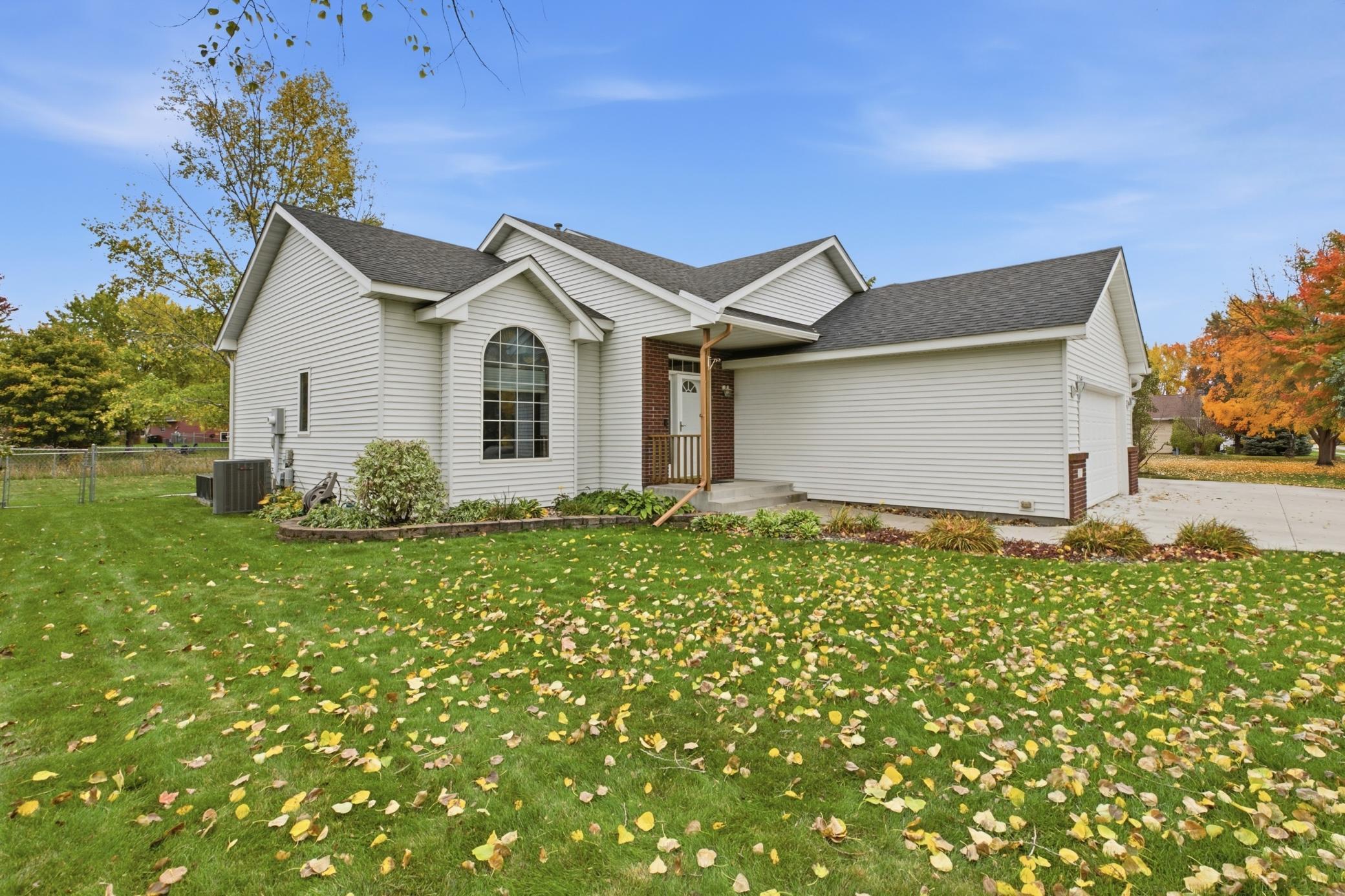 You’ll appreciate the attractive exterior featuring durable steel siding, brick accents, seamless rain gutters, and architectural shingles installed in the summer of 2021.