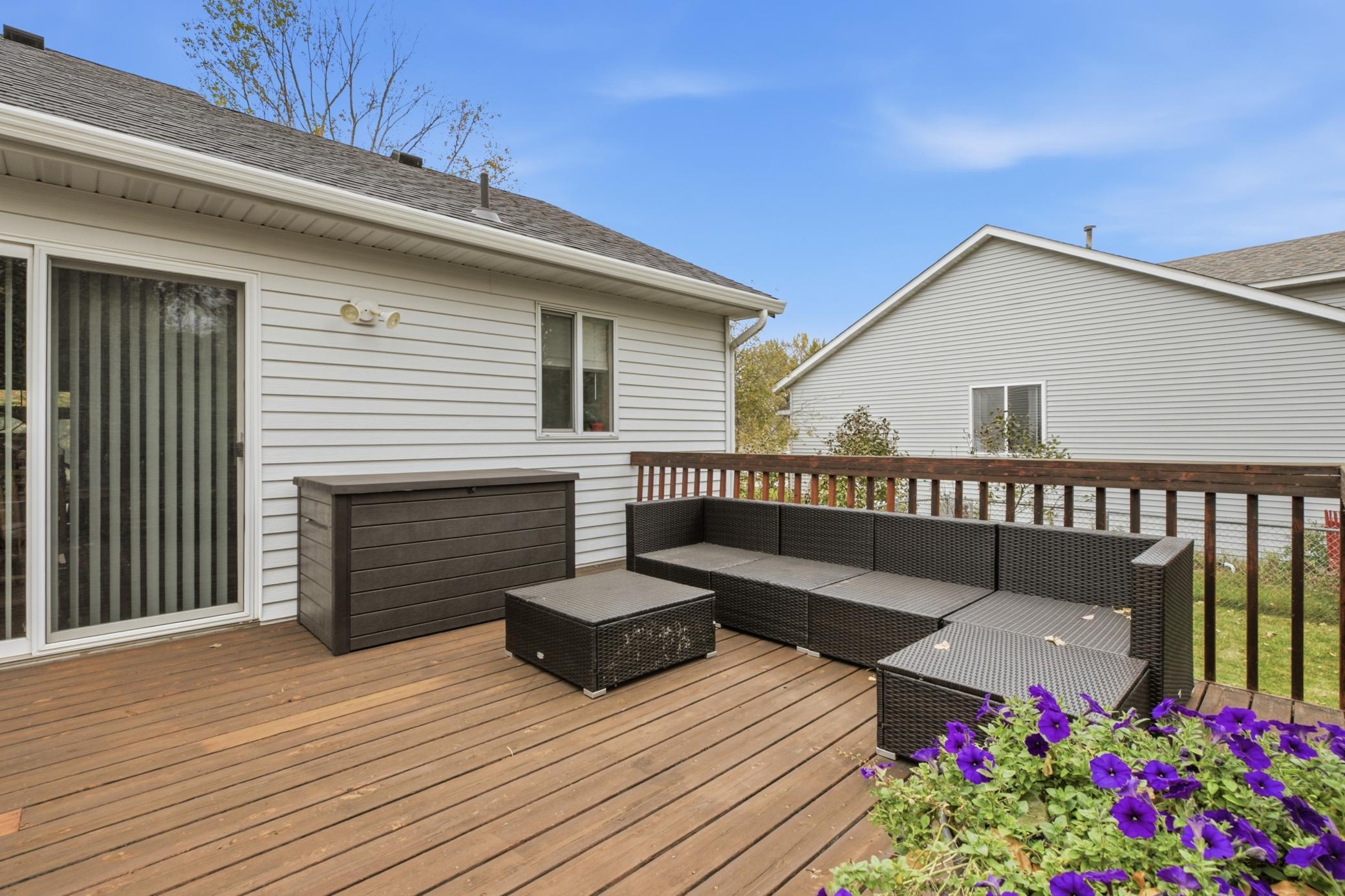 Outdoor living is just as inviting, with a spacious 14.6-by-16.6-foot cedar deck overlooking the fenced backyard.