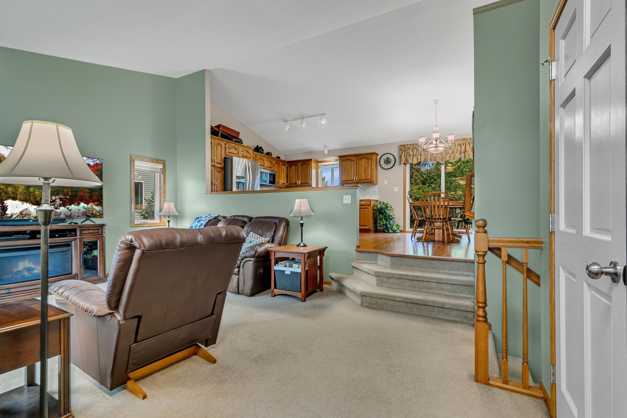 A couple steps down take you into the living room and the wide case opening allows for easy conversation between the rooms.