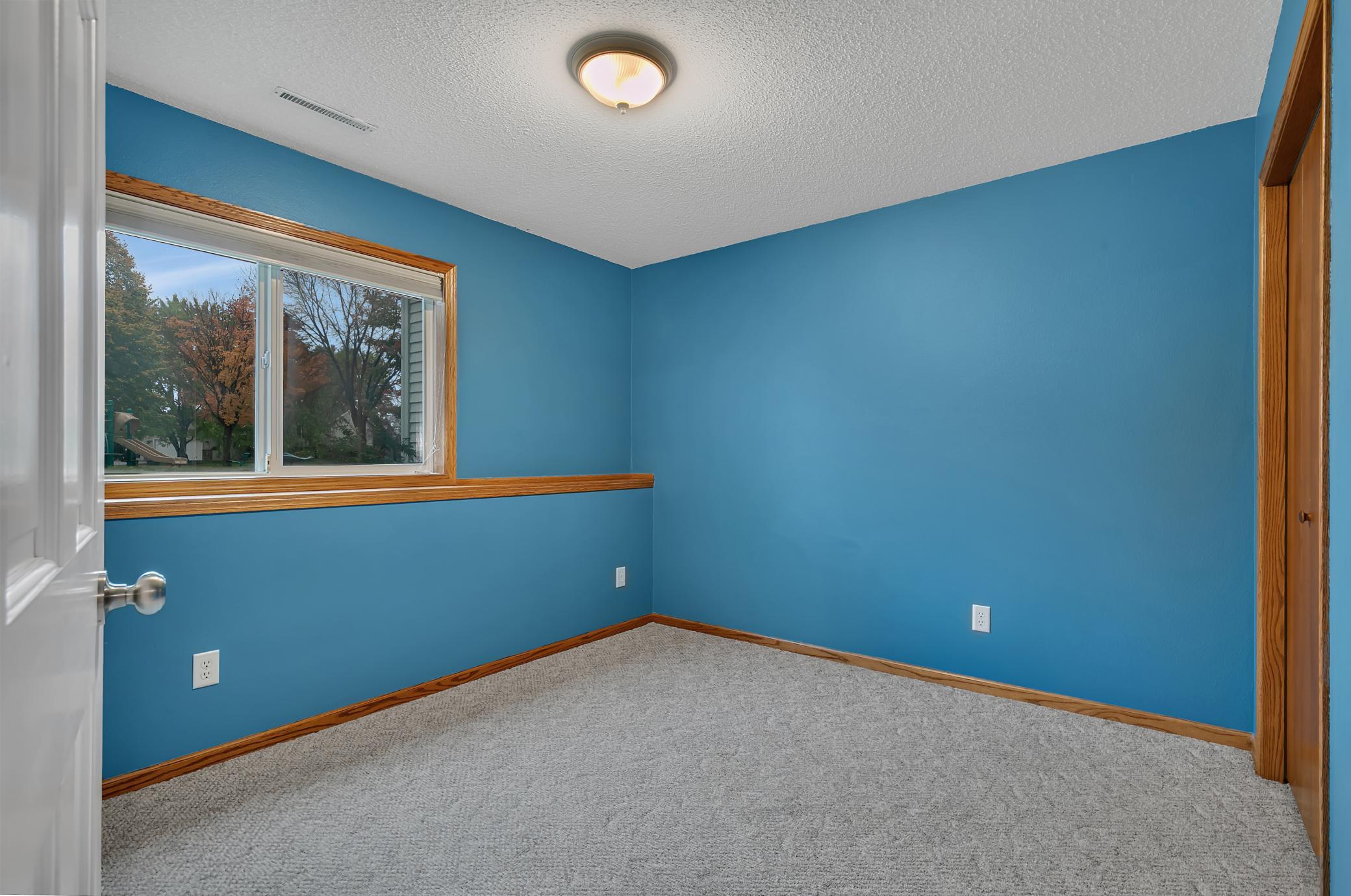 The lower-level family room, bedroom, and bathroom, along with the main-level coat closet, received six-panel doors in 2018.