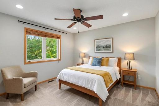 Virtually staged private primary suite showing the bedroom's layout.