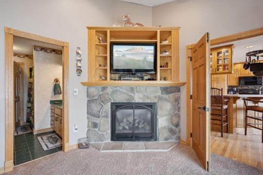 Amazing Gas Fireplace with Stone Trim in the Primary Bedroom