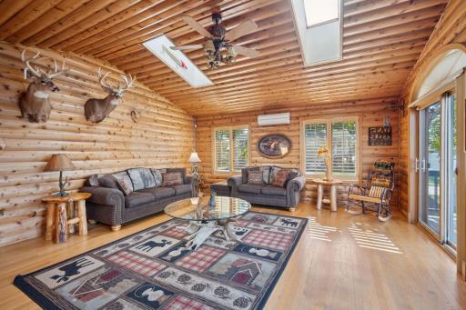 Large Living Room Space for Gatherings with Lots of Natural Light Pouring In